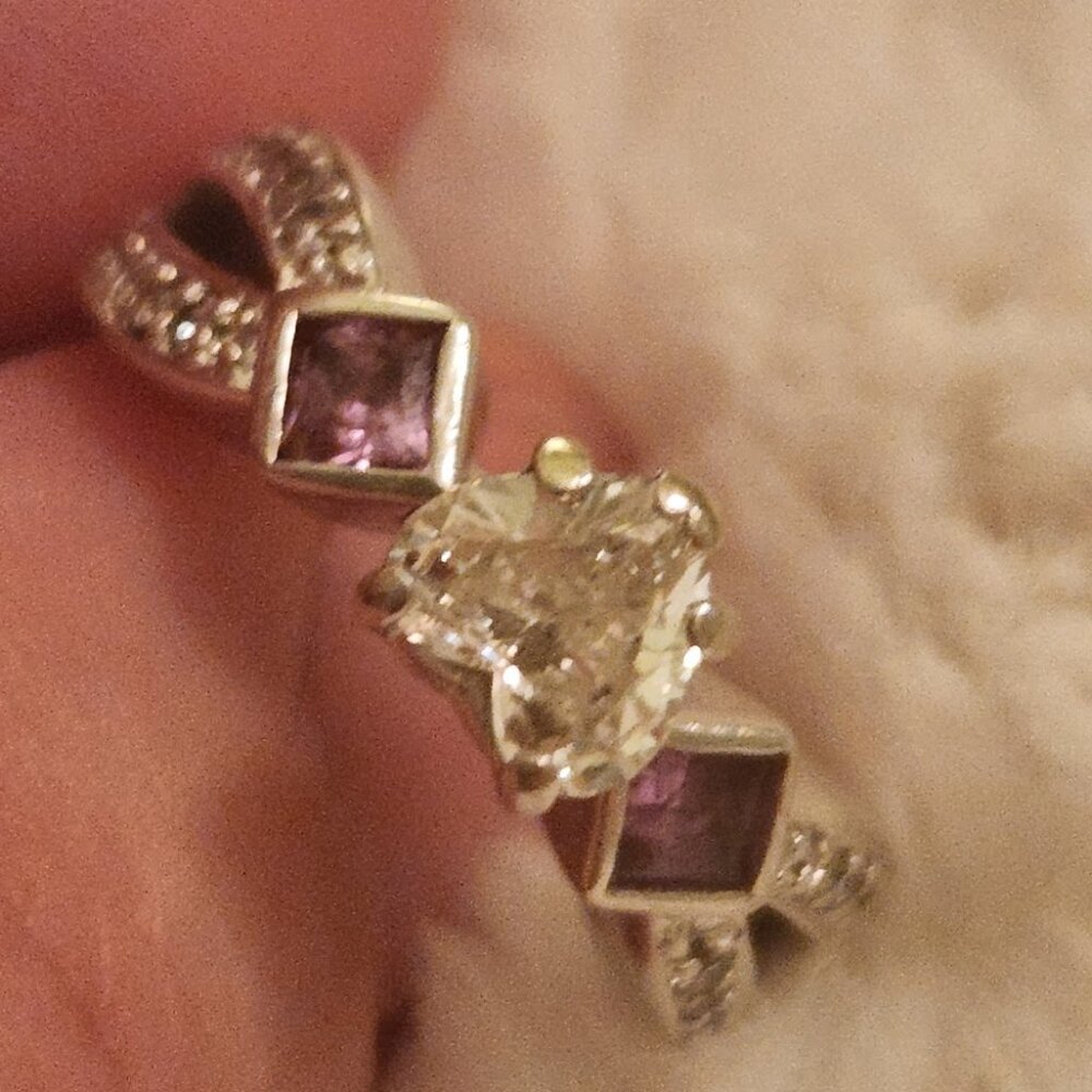 1/2 carat Heart Diamond surrounded by pink sapphires set in 18kt wg ring